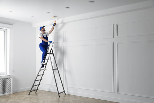 professional painter working safely